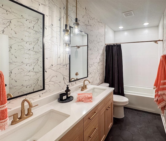 full bathroom featuring a sink, tile patterned flooring, toilet, and visible vents