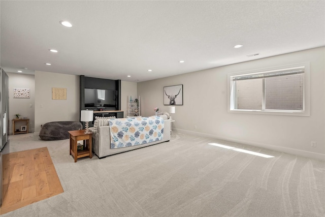 3319 NE 8th St, Ankeny, IA 50021 - living area with light colored carpet, recessed lighting, baseboards, and visible vents