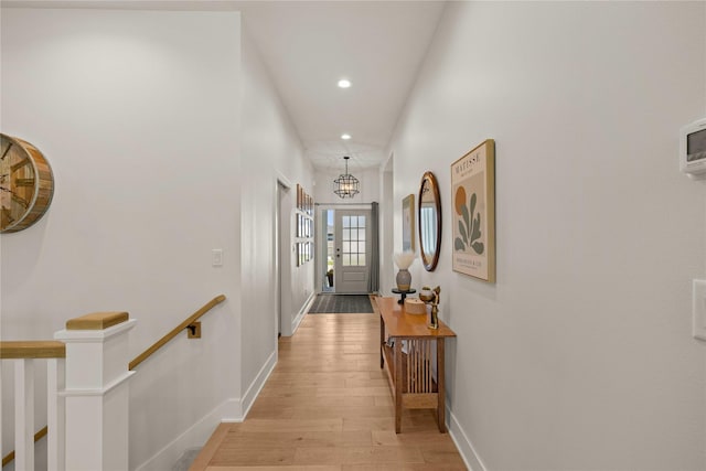 3319 NE 8th St, Ankeny, IA 50021 - hall featuring recessed lighting, baseboards, an upstairs landing, and light wood-type flooring