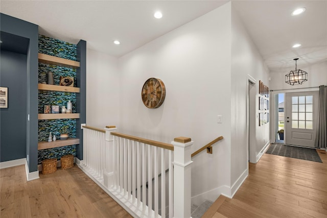 3319 NE 8th St, Ankeny, IA 50021 - entrance foyer with baseboards, recessed lighting, hardwood / wood-style floors, and a chandelier