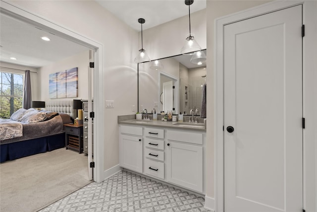3319 NE 8th St, Ankeny, IA 50021 - bathroom featuring double vanity, a sink, ensuite bath, and a shower stall