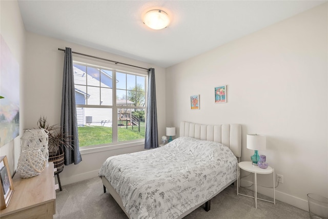 3319 NE 8th St, Ankeny, IA 50021 - carpeted bedroom featuring baseboards and multiple windows