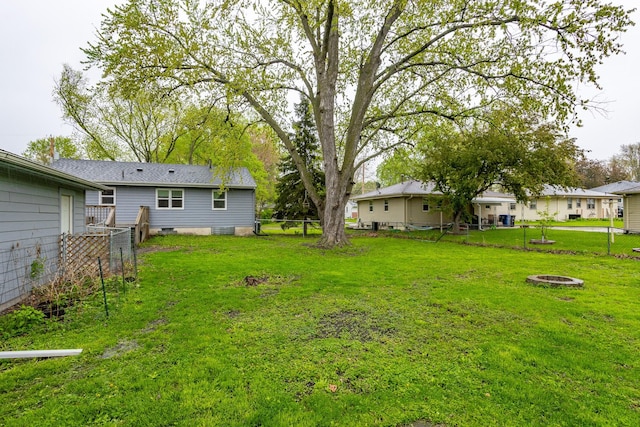 3924 55th St, Des Moines, IA 50310 - view of yard with an outdoor fire pit