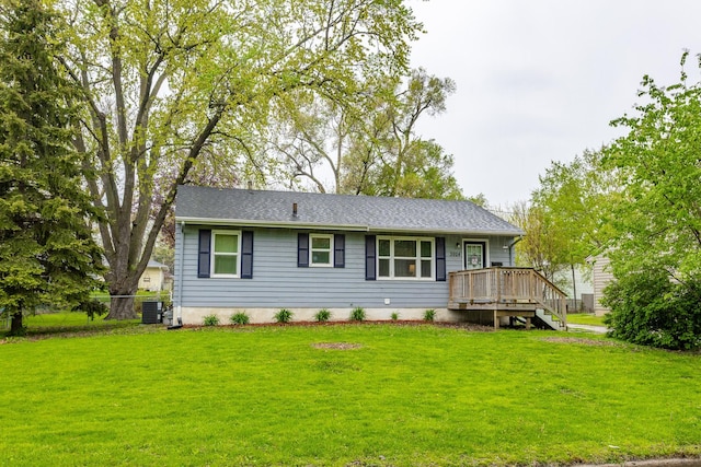 3924 55th St, Des Moines, IA 50310 - back of house with a lawn, central air condition unit, and a deck