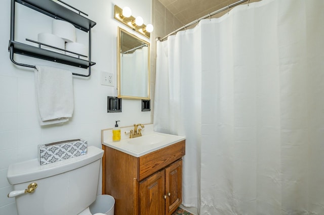 full bath with vanity and toilet