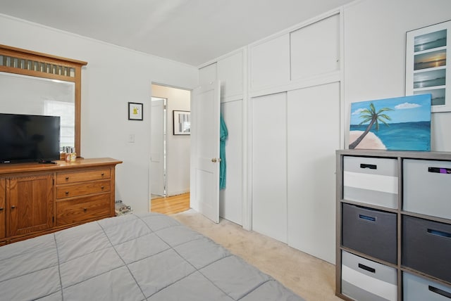 4131 Cornell St, Des Moines, IA 50313 - bedroom featuring a closet and light colored carpet