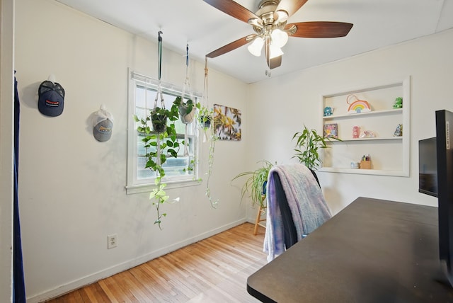 4131 Cornell St, Des Moines, IA 50313 - office featuring baseboards, ceiling fan, wood finished floors, and a wealth of natural light