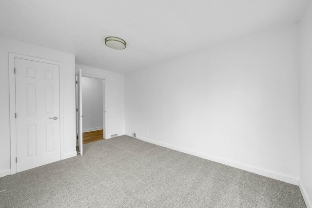 4038 57th St, Des Moines, IA 50310 - unfurnished bedroom with baseboards and carpet