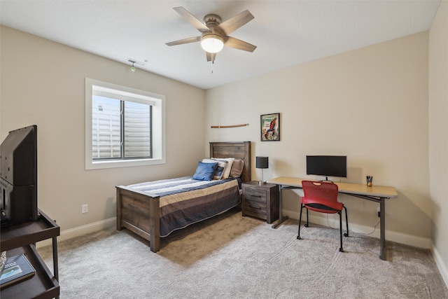 bedroom with baseboards, visible vents, ceiling fan, and carpet