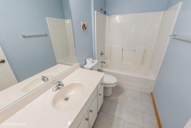 7422 SE 23rd St Unit 6, Des Moines, IA 50320 - full bath with vanity, toilet, bathing tub / shower combination, and tile patterned floors