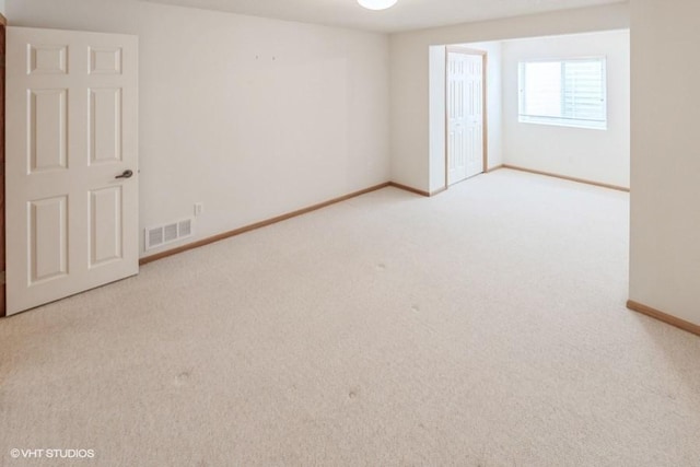 7422 SE 23rd St Unit 6, Des Moines, IA 50320 - carpeted spare room with baseboards and visible vents