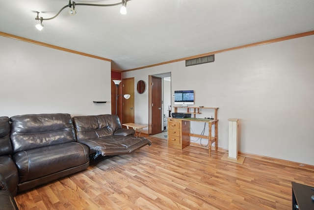 4202 62nd St Unit 6, Urbandale, IA 50322 - living area featuring visible vents, ornamental molding, and light wood finished floors
