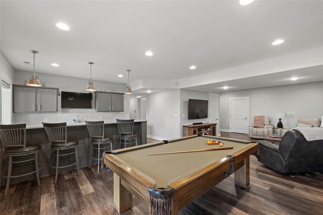 5129 NE Seneca Dr, Ankeny, IA 50021 - recreation room with bar with sink, dark wood finished floors, recessed lighting, and pool table