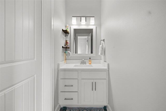 5129 NE Seneca Dr, Ankeny, IA 50021 - bathroom featuring vanity and baseboards