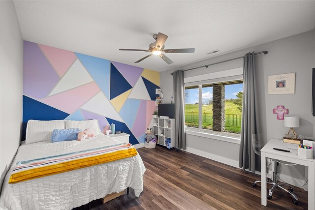 5129 NE Seneca Dr, Ankeny, IA 50021 - bedroom featuring wood finished floors and a ceiling fan