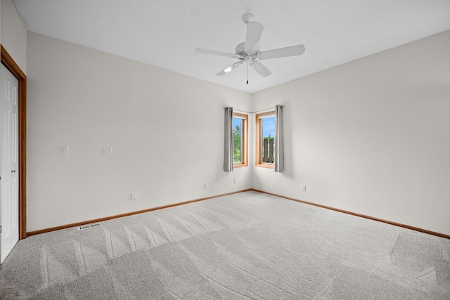 5099 Clover Ridge Rd, Panora, IA 50216 - carpeted spare room featuring baseboards, ceiling fan, and visible vents