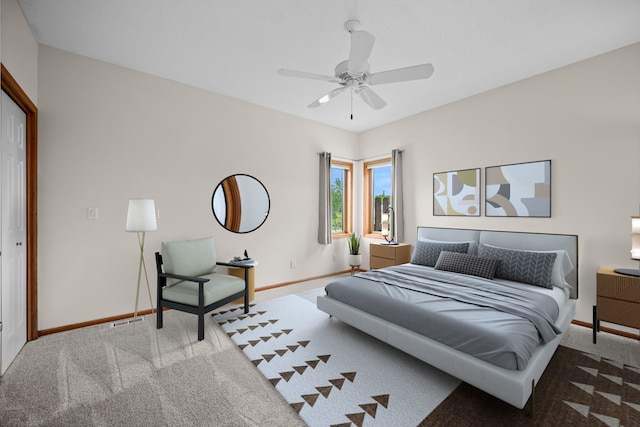 5099 Clover Ridge Rd, Panora, IA 50216 - carpeted bedroom featuring baseboards, ceiling fan, and visible vents