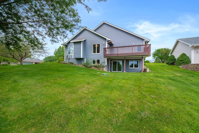 5099 Clover Ridge Rd, Panora, IA 50216 - back of property featuring a lawn and a wooden deck