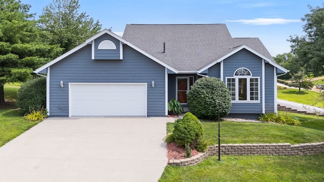 5099 Clover Ridge Rd, Panora, IA 50216 - ranch-style house featuring a garage, roof with shingles, a front yard, and concrete driveway