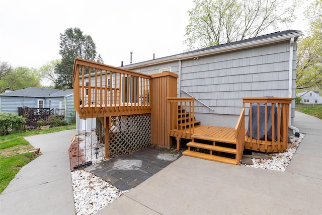 wooden deck featuring a patio
