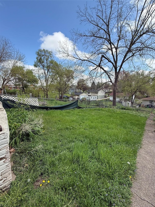 view of yard with fence