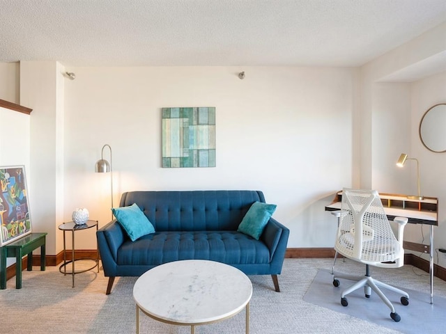 interior space with baseboards and carpet