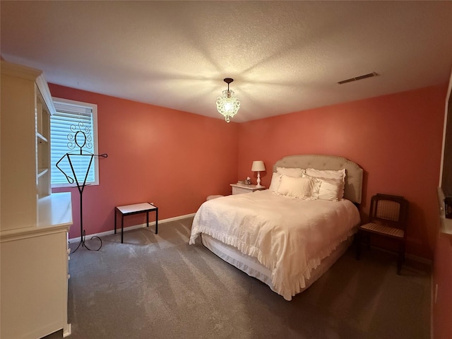 bedroom with visible vents, carpet, and baseboards