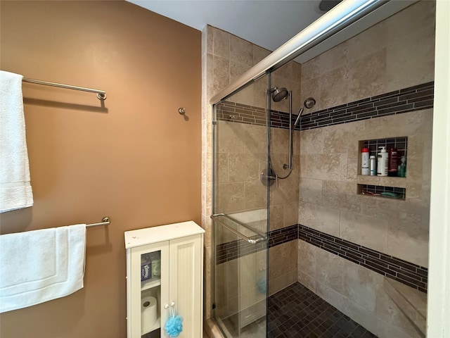 full bathroom featuring a shower stall