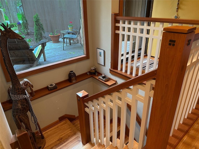 956 55th St, West Des Moines, IA 50266 - staircase with wood finished floors