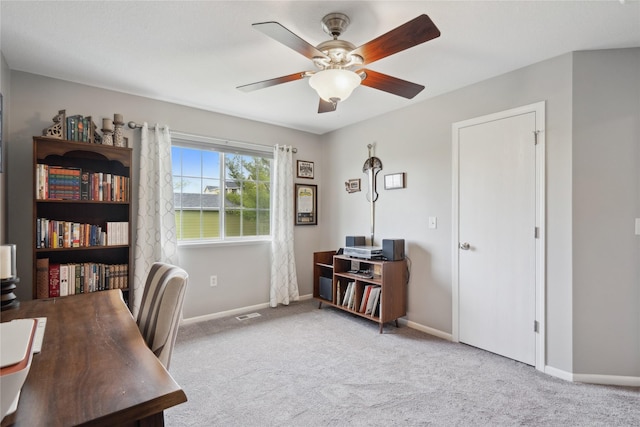 office with carpet flooring, ceiling fan, and baseboards