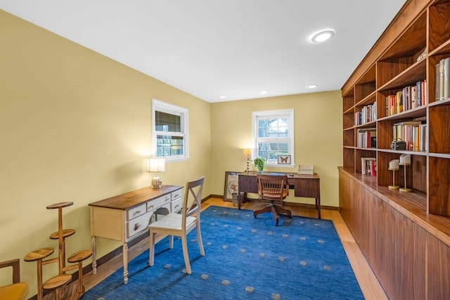 home office with recessed lighting, baseboards, and light wood-type flooring