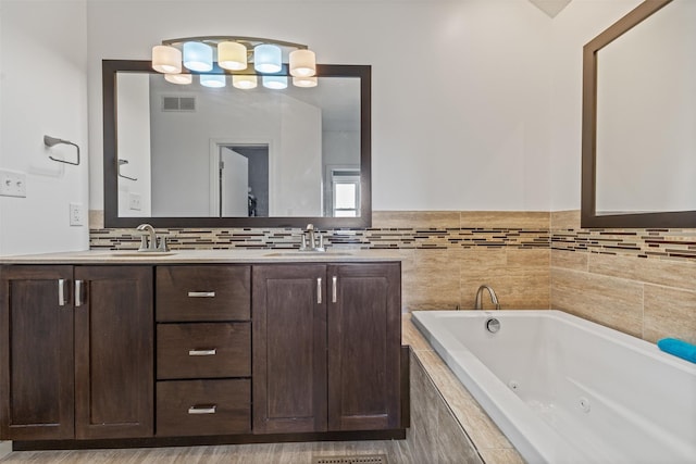 727 SE Richland Ct, Ankeny, IA 50021 - full bathroom with a whirlpool tub and double vanity