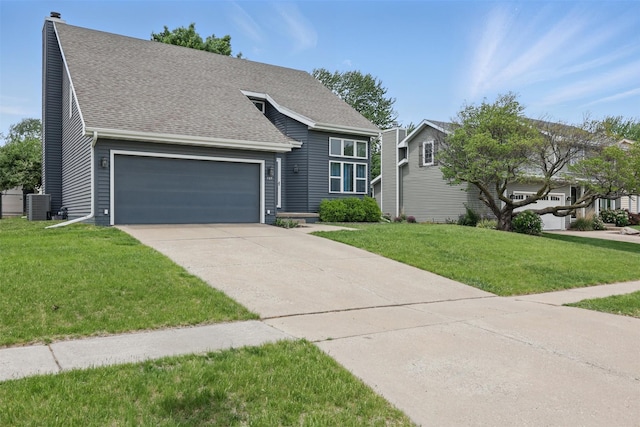 727 SE Richland Ct, Ankeny, IA 50021 - view of front of house featuring an attached garage, roof with shingles, central AC, and a front yard