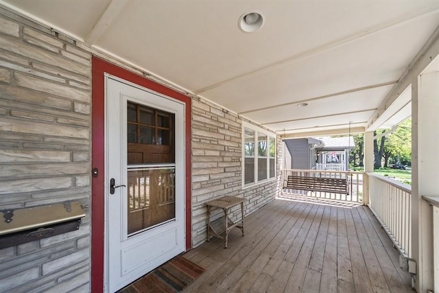 deck with covered porch