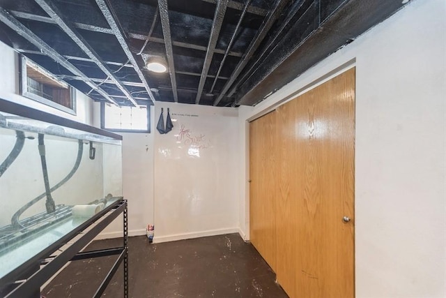 basement featuring baseboards