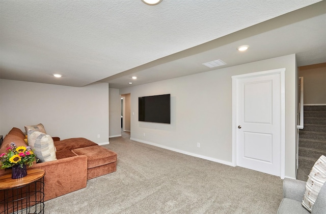1150 NW Williamsburg Ln, Waukee, IA 50263 - living room featuring carpet flooring, stairway, baseboards, recessed lighting, and a textured ceiling