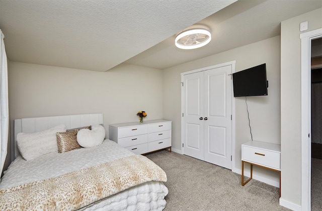 1150 NW Williamsburg Ln, Waukee, IA 50263 - carpeted bedroom featuring a closet and baseboards