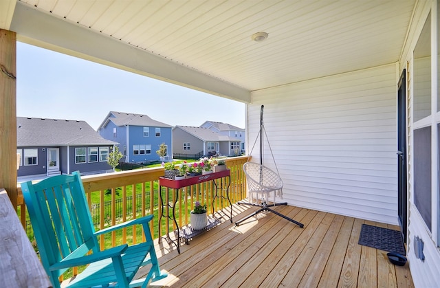 1150 NW Williamsburg Ln, Waukee, IA 50263 - wooden terrace featuring a residential view