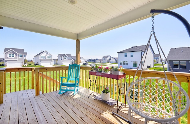 1150 NW Williamsburg Ln, Waukee, IA 50263 - wooden terrace featuring a residential view and a lawn
