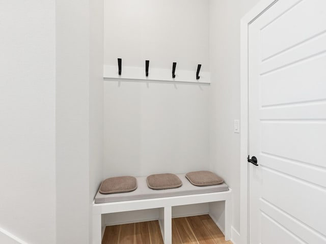 mudroom with light wood finished floors
