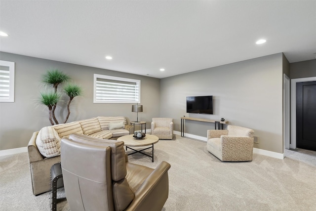 living room with carpet, baseboards, and recessed lighting