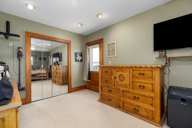 1208 310th Ave, Malcom, IA 50157 - bedroom featuring light carpet and baseboards
