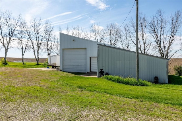1208 310th Ave, Malcom, IA 50157 - view of pole building featuring a yard