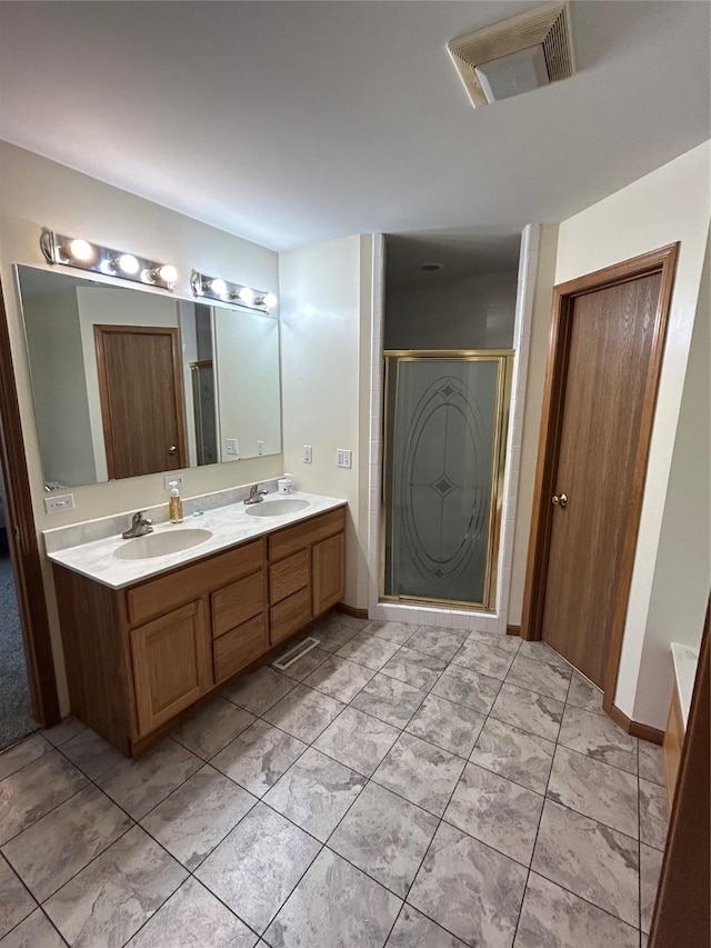 4460 Leo Dr, Panora, IA 50216 - bathroom with double vanity and a shower stall