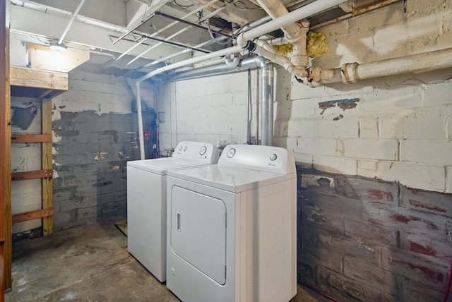 laundry area featuring laundry area and washer and clothes dryer