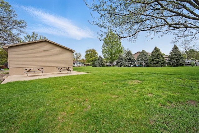 view of yard with a playground