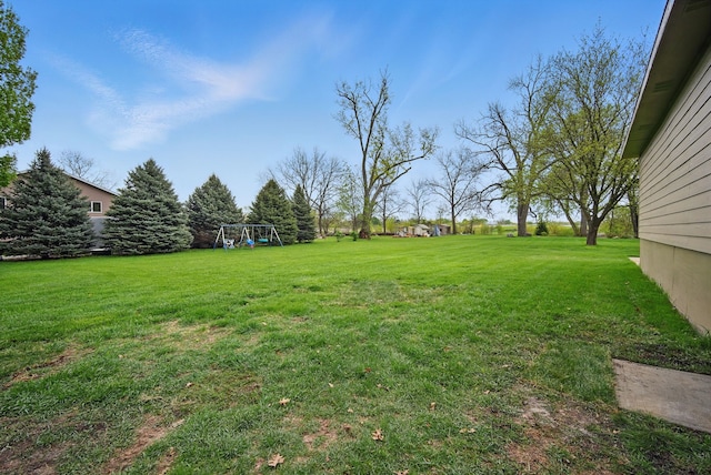 view of yard with a playground