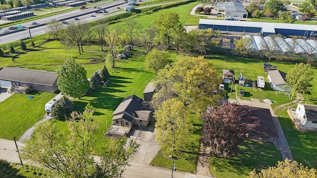 birds eye view of property with a residential view