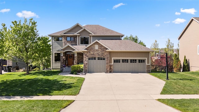 craftsman-style home featuring concrete driveway, an attached garage, stone siding, and a front yard
