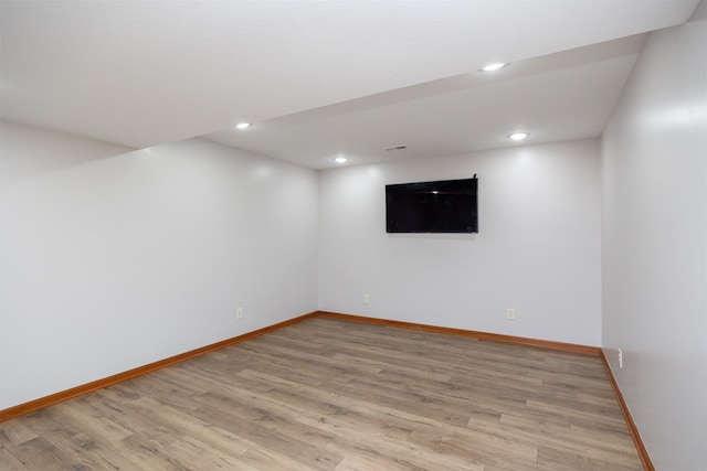 4110 140th St, Urbandale, IA 50323 - finished below grade area with baseboards, light wood-type flooring, and recessed lighting